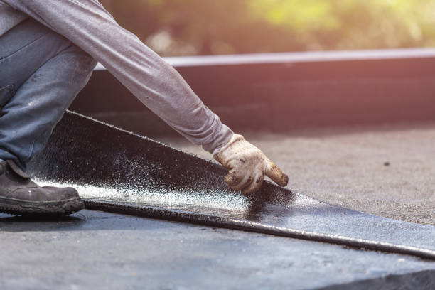 Professional Basement Waterproofing technician working in Trufant, MI